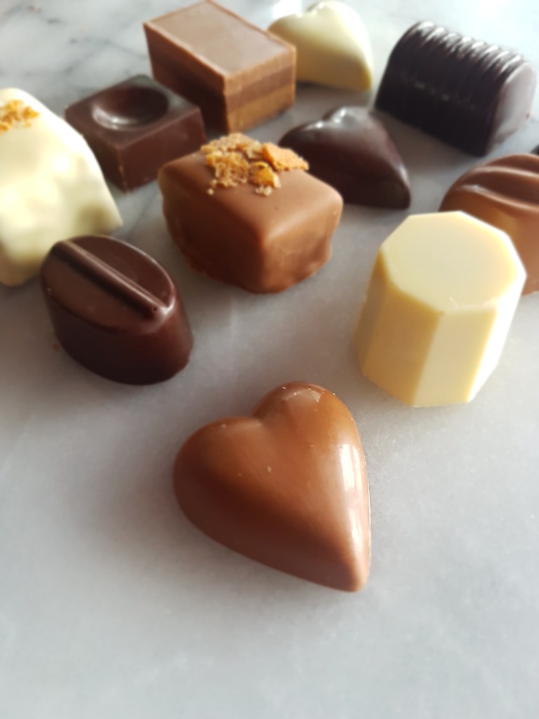 collection of chocolates in different colours and shapes